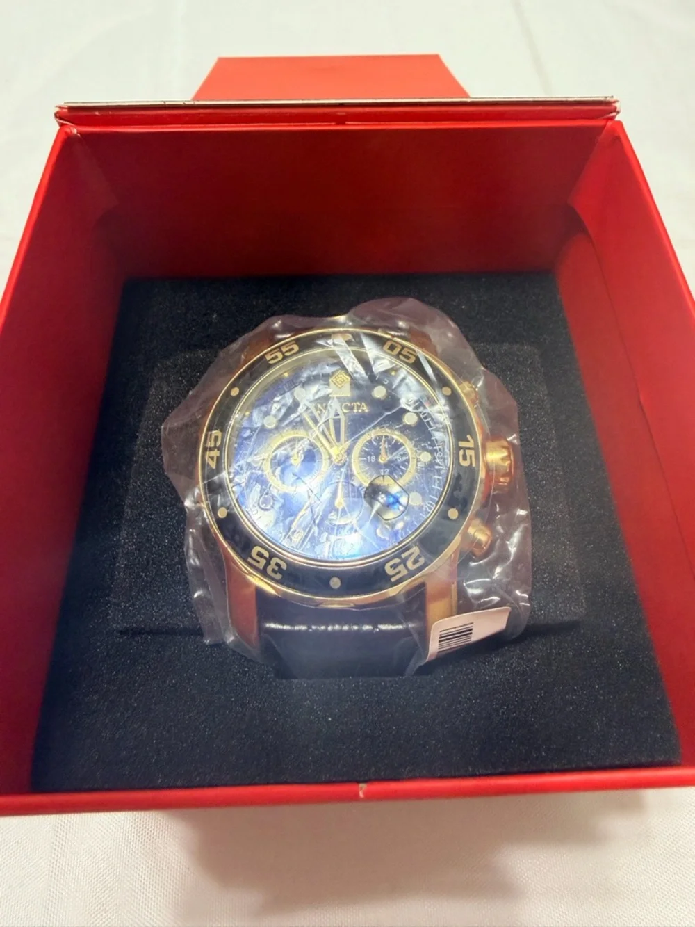 Invicta Men’s Gold and Black Chronograph Sport Watch